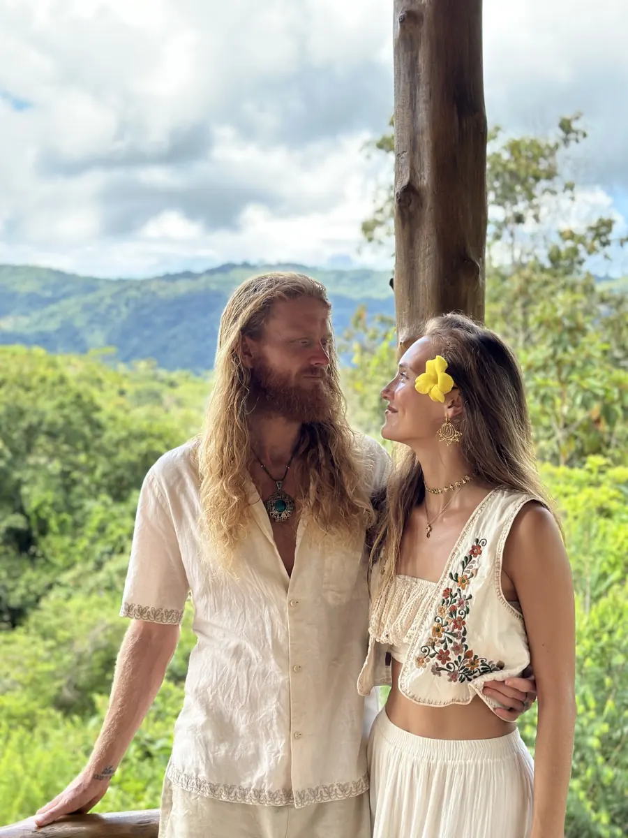 Kene and Maisie on a balcony above the rainforest