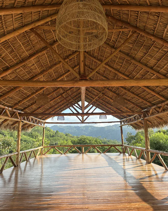 Inside the yoga shala, open to the mountains