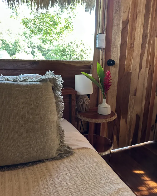 A bed by the window