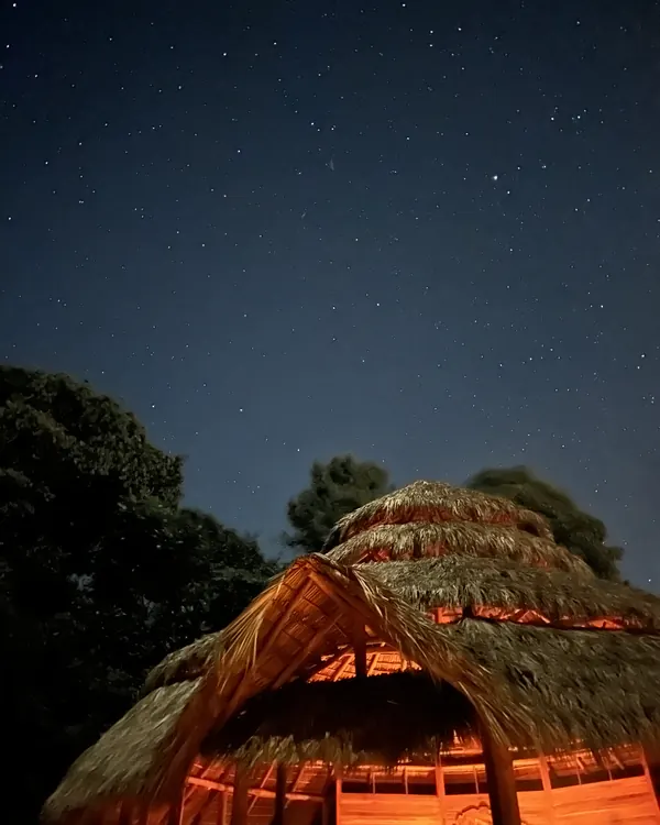 Inside the Maloca, the fire circle at its centre