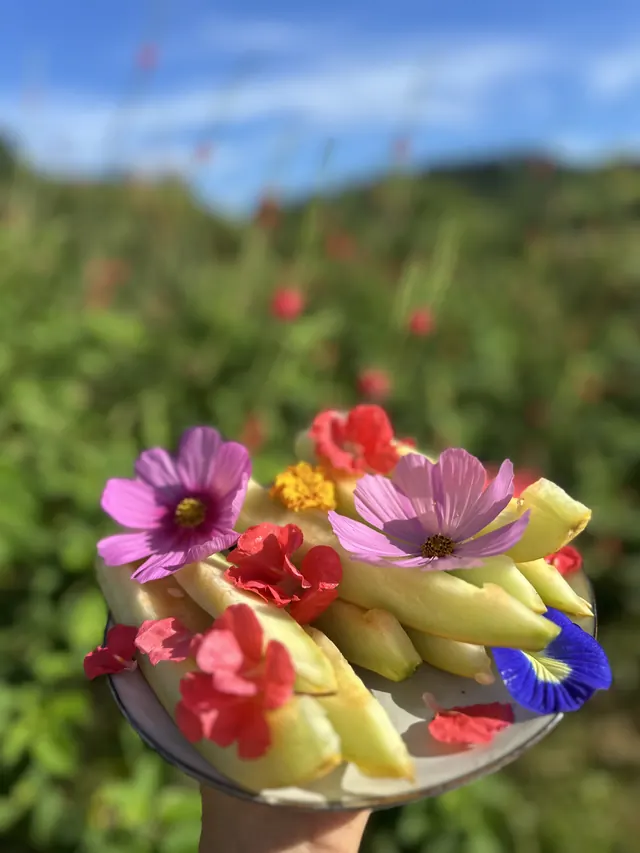 Fruit dressed with fresh flowers
