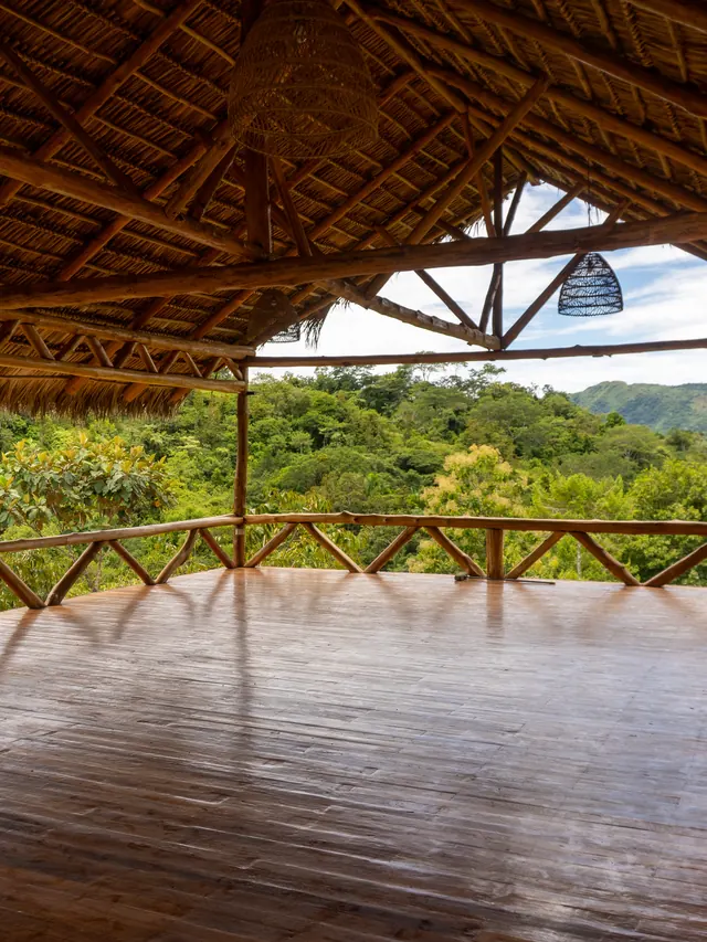 The shala floor, open to the forest on every side