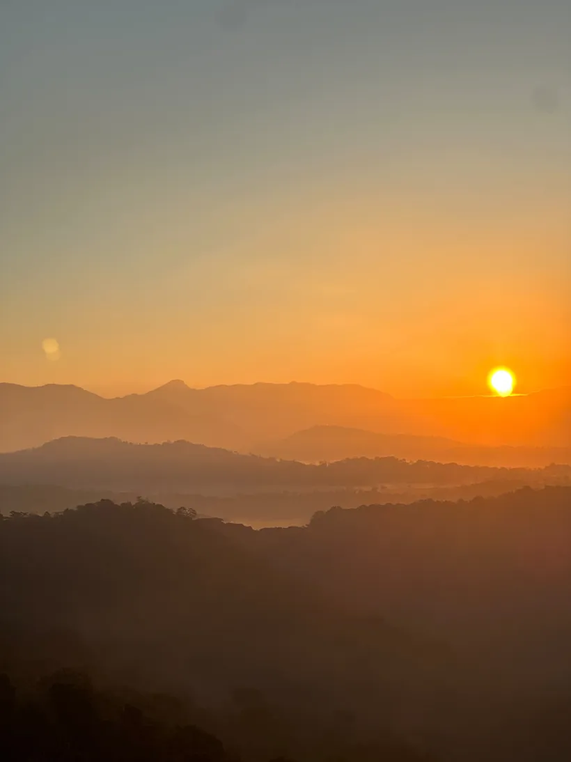 Sunrise over the misty valley