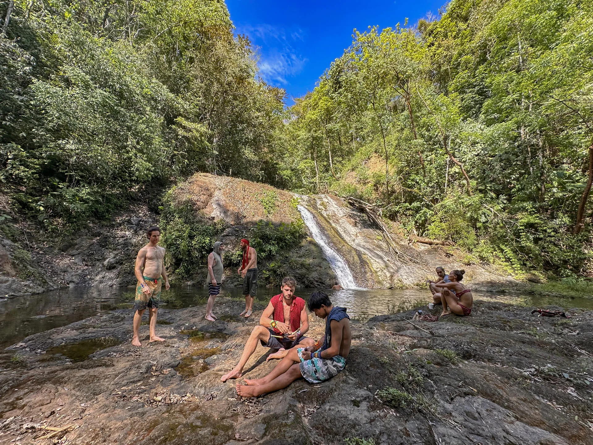 Guests at one of the waterfalls on the land